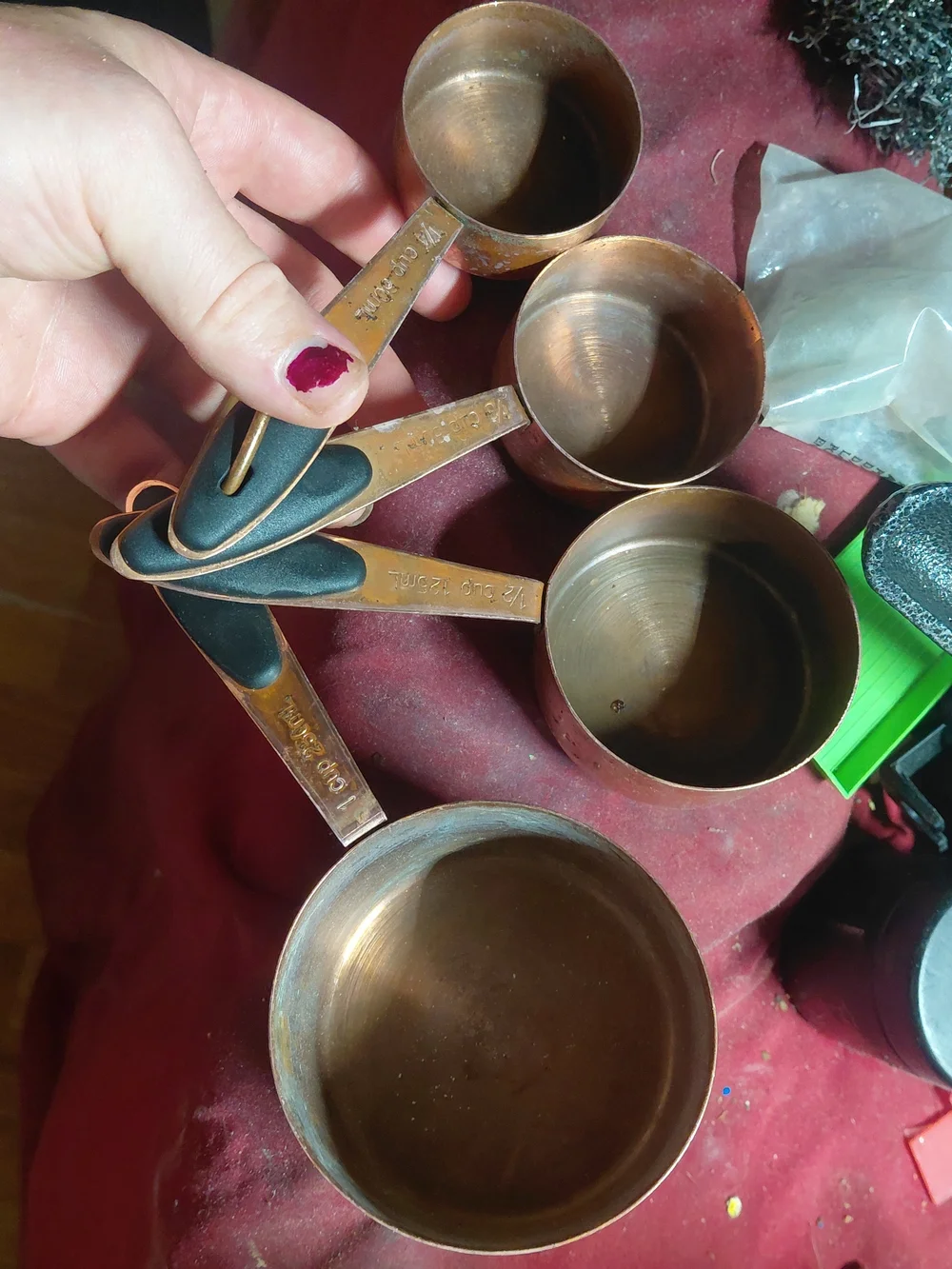 set of copper-plated stainless steel measuring cups